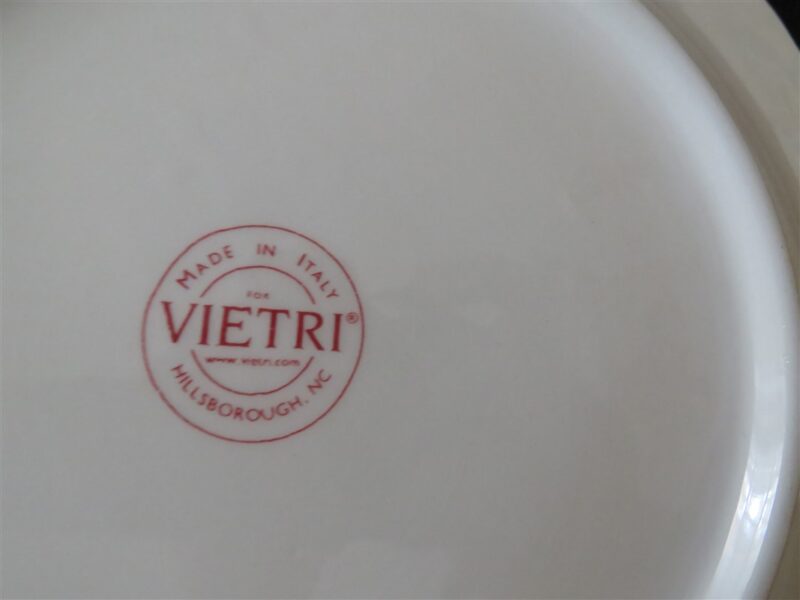 Vietri Made In Italy Pasta Bowl Purple Floral Design 9 ¼ inches diameter. 1 ½ inches deep. Made in Italy. Vietri of Hillsborough, N.C. Very good condition. No cracks, dings, chips or scratches. Colors are bright. Must be considered as used. Look carefully at the flower. Bowls come with different flowers pattern. 2