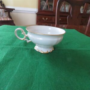 Vintage Hutschenreuther Selb Footed Cup Brighton pattern Cup 4” diameter & 2 ¼” tall White body , gold gilt accents. Made in Bavaria, Germany. Fine condition , no chips . Gold trim is beautiful. Stamp was used 1939-1965. On the bottom the name “kristina” in gold script. 1
