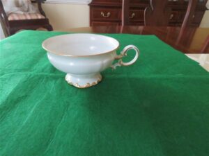 Vintage Hutschenreuther Selb Footed Cup Brighton pattern Cup 4” diameter & 2 ¼” tall White body , gold gilt accents. Made in Bavaria, Germany. Fine condition , no chips . Gold trim is beautiful. Stamp was used 1939-1965. On the bottom the name “kristina” in gold script. 2