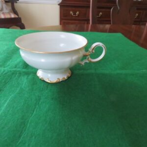 Vintage Hutschenreuther Selb Footed Cup Brighton pattern Cup 4” diameter & 2 ¼” tall White body , gold gilt accents. Made in Bavaria, Germany. Fine condition , no chips . Gold trim is beautiful. Stamp was used 1939-1965. On the bottom the name “kristina” in gold script. 2
