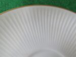 White Saucer with Gold Ring 6 inch diameter. Stamp on back in gold reads Noritake Fine China Japan. Excellent cndition. No chips, cracks, scartches. Must be considered as used. 4