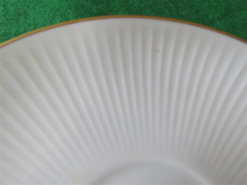 White Saucer with Gold Ring 6 inch diameter. Stamp on back in gold reads Noritake Fine China Japan. Excellent cndition. No chips, cracks, scartches. Must be considered as used. 4