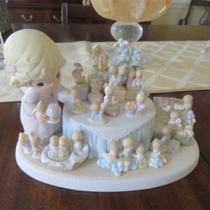 Precious Moments From the Beginning. Girl Displaying Favorite Original 21 Collectibles - Celebration of Precious Moments 25th anniversary. 6