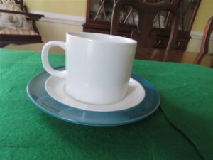 Crown Corning Japan Cup & Saucer. White base. Green rim. 1