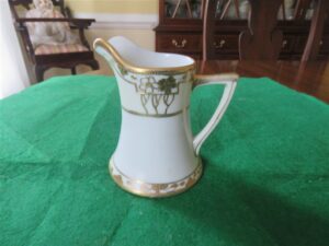 Nippon Gold Creamer Marked M Raised gold trim. Hand painted. 1