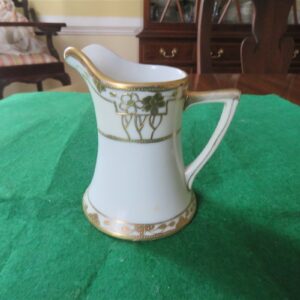 Nippon Gold Creamer Marked M Raised gold trim. Hand painted. 1