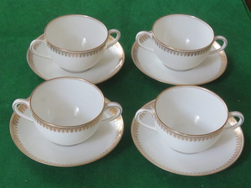 Flat Bouillon Cup & Saucer by Charles Ahrenfeldt. Made for the Cromwell And Hubbard of Cleveland One set of 4 cups and saucers. 1