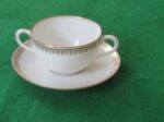 Flat Bouillon Cup & Saucer by Charles Ahrenfeldt. Made for the Cromwell And Hubbard of Cleveland One set of 4 cups and saucers. 2