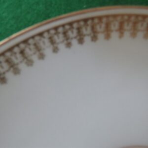 Flat Bouillon Cup & Saucer by Charles Ahrenfeldt. Made for the Cromwell And Hubbard of Cleveland One set of 4 cups and saucers. 4