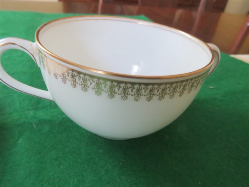 Flat Bouillon Cup & Saucer by Charles Ahrenfeldt. Made for the Cromwell And Hubbard of Cleveland One set of 4 cups and saucers. 5