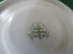 Flat Bouillon Cup & Saucer by Charles Ahrenfeldt. Made for the Cromwell And Hubbard of Cleveland One set of 4 cups and saucers. 7