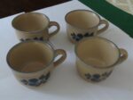 Pfaltzgraff Folk Art Flat Cups USA Blue Tan Pattern 001 Set of vintage flat cups with classic folk art design Warm blue and tan tones with timeless country charm 1