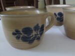Pfaltzgraff Folk Art Flat Cups USA Blue Tan Pattern 001 Set of vintage flat cups with classic folk art design Warm blue and tan tones with timeless country charm 2