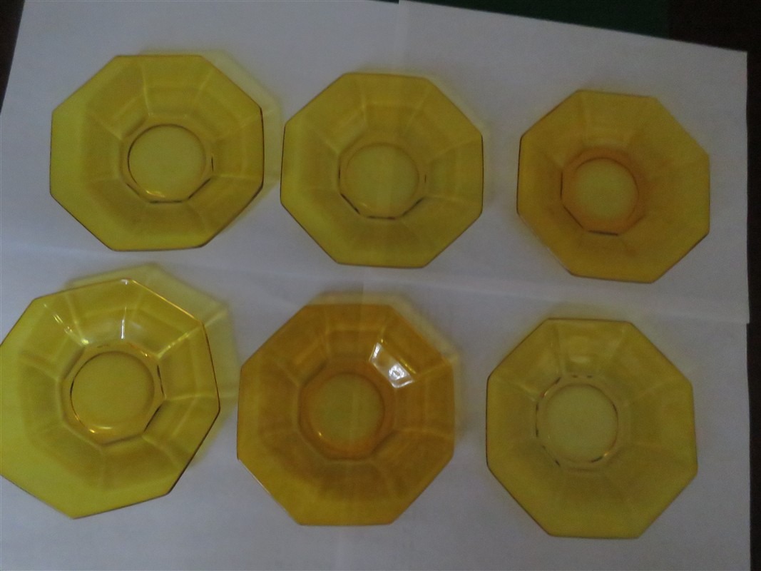 101159L10 (1067 x 800) amber glass saucer 45
