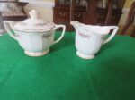 Sebring Ivory Porcelain "Normandie" matching creamer and covered sugar bowl 1