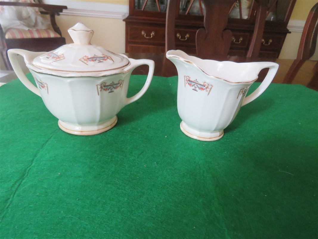 101176L1 (1067 x 800) Sebring Ivory Porcelain "Normandie" matching creamer and covered sugar bowl 1