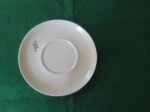 W.S. George Ranchero Ivory 6-inch saucer with an EOC monogram. 1